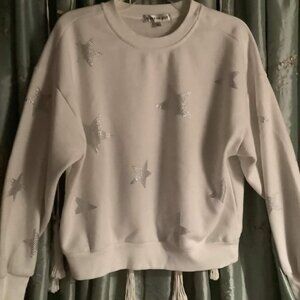 Madden girl white sweater with silver stars.
